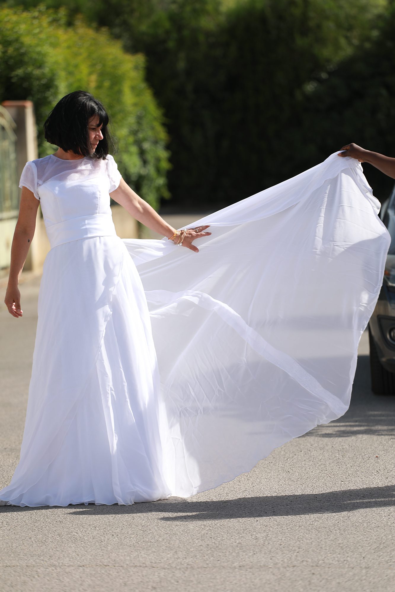 Gros plan du bustier de la robe de mariée Sophie sur mesure, soulignant les finitions couture, la taille marquée et le savoir-faire artisanal de l'atelier Princesse Couture.